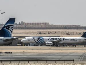 EgyptAir planes wait on the tarmac at Cairo International Airport on May 19 2016. (AFP/Khaled Desouki)