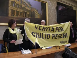 The parents of Italian student Giulio Regeni hold a banner reading ''Truth for Giulio Regeni'' during a press conference in Rome March 29, 2016.  (AFP/Andreas Solaro)