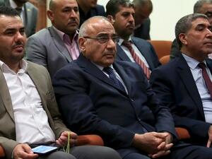 Adel Abdel Mahdi (C) has been given the difficult task of forming the next Iraqi government (AFP Photo/STRINGER)