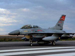 A handout picture released by the Egyptian defence ministry on February 16, 2015 shows a fighter jet landing at an undisclosed location in Egypt following air strikes in Libya (AFP)