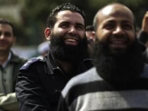 A bearded Egyptian police officer takes part in a protest in Cairo. (AFP/ File)