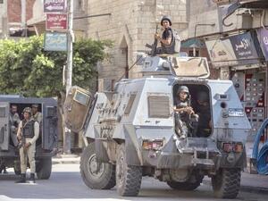 Egyptian police guard street in North Sinai provincial capital of al-Arish last month (AFP/file photo)