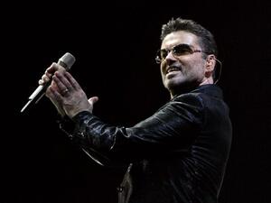 British pop star George Michael, whose publicist said December 25, 2016 had died, performs on stage at the Palau Sant Jordi in Barcelona 23 September 2006. (AFP/Cesar Rangel) 