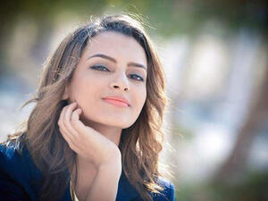 Carmen Suleiman smiles with the satisfaction of her success. (Image: Facebook)