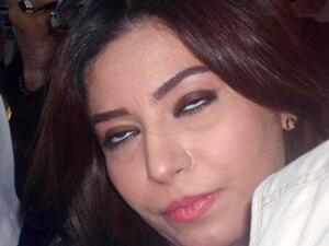 Ghada Rajab rolls her eyes backward, or should we do that after all the dramatic hype over her fall. 