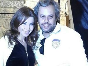 Behind the scenes of Nancy's new music video with her director. (Image: Twitter)