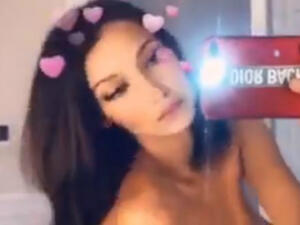 American model Bella Hadid tweeted a topless video of her through the mirror and did not forget to add a hearts filter to it. (source: Twitter - @bellahadid)