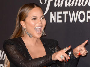 Chrissy uploaded a professional shot taken from the Grammy Awards red carpet earlier in the evening, where her burgeoning bump is on full display (Source: Kathy Hutchins - Shutterstock)