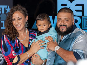 DJ Khaled, Nicole Stock, and their son. (Jamie Lamor Thompson / Shutterstock.com)