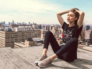 Gigi Hadid is collaborating with Reebok to sell Reebok Club C 85 and Classic Leather in two colorways, Pearl Met and Grey Gold. (Reebok)