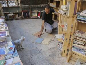 Hamzeh Al Maaytah at his stall. (AFP)