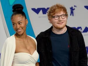 Jennie Pegouski and Ed Sheeran arrive. (Jim Ruymen / UPI)