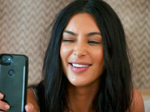 Probably what Kim Kardashian looked like Tweeting. (E! Network)
