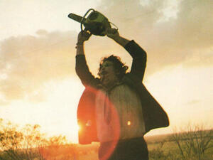 Leatherface raises his chainsaw in tribute, not blood. (Bryanston Pictures)