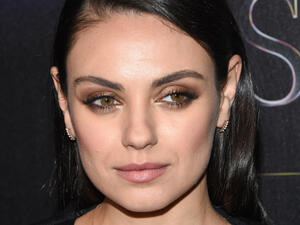 Mila Kunis wants her to daughter to start drinking early. (DFree / Shutterstock.com)