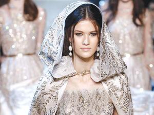 A model presents a creation by Elie Saab as part of the collection. (AFP)