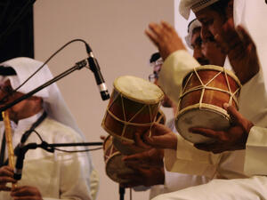 Saudi Arabian men hit the tabla. (Aisyaqilumaranas / Shutterstock.com)
