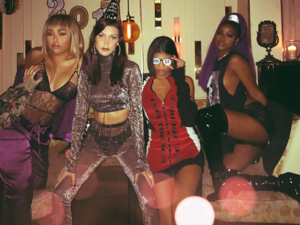 Bella Hadid posted on Instagram, showing herself wearing a pointed party hat as she posed with friends on New Years Eve. (Instagram) 