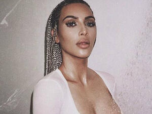 Kim shared several sultry looks on Monday including this topless shot regardless of being accused of cultural appropriation (Source: kimkardashian - Twitter)