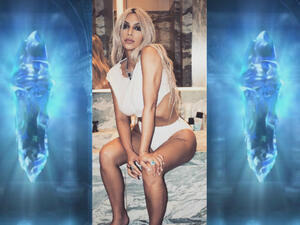 Kim Kardashian wants you to believe in the power of the crystals. (Instagram / kimkardashian / Square Enix)