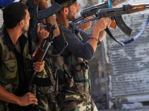 Soldiers of the Free Syrian Army are set to receive training and weapons from the US and allies (File-AFP)