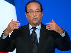 French President Francois Hollande will not backtrack on his promise to host 30,000 refugees within the next two years. (AFP/File)