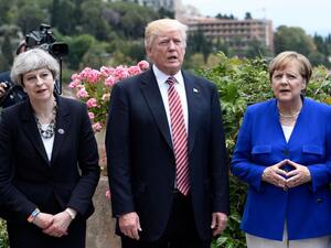 Trusted friends: UK Prime Minister Theresa May, US President Donald Trump, and German Chancellor Angela Merkel during G7 Summit. (AFP/ File Photo)