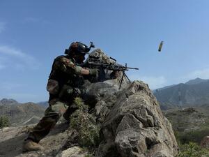 An Afghan security force personnel fires during an ongoing an operation against Islamic State. (AFP/ File)