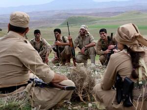 Kurdish Peshmerga fighters gather in Koya, 100 km north of Erbil, the capital of Iraq's autonomous Kurdistan region.  (AFP/File)