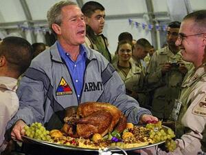 President George W. Bush with U.S. troops in Iraq in 2003. Bush is not endorsing Donald Trump (AFP). 