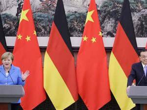 China's Premier Li Keqiang (R) and German Chancellor Angela Merkel attend a joint news conference in Beijing on May 24, 2018. (AFP/ File)
