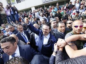 Saad Hariri takes a selfie after leaving a polling station in past poll (AFP/File Photo)	