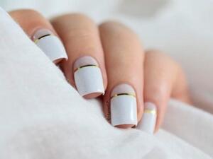 الابيض والذهبي موضة الاظافر لهذا الموسم 