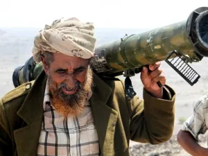 A fighter loyal to President Abd Rabbuh Hadi at a position taken from Houthi rebels northwest of Taiz in April 2018 (AFP/ File)