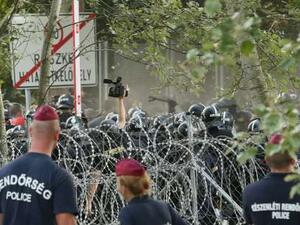 Hungarian border police apparently made the scarecrows (AFP/Sandor Gemesi)