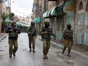 Israeli soldiers patrol in the West Bank city of Hebron. (AFP/File)