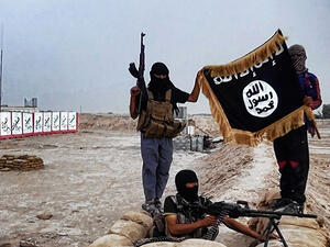 Daesh fighters in Iraq display their flag. (AFP/File)