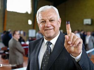Iraqi ambassador in Iran Rajih al-Moussawi goes to a polling station. (Twitter)