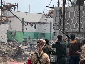 Yemeni men and security forces inspect the site of a suicide bombing in the southern port city of Aden, on November 5, 2017. (AFP/File)