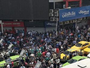 Hundreds chant “death to the dictator" at industrial complex. (AFP)