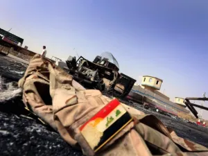 A jacket belonging to an Iraqi soldier lies on the ground ten kilometers from Mosul. (AFP/File)