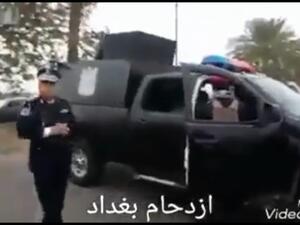 'Baghdad traffic', an Iraqi traffic officer confronts ministerial security over its road block (screenshot)