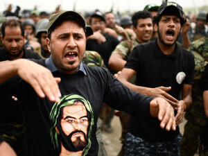 Some leading figures - such as Prime Minister Haider al-Abadi and powerful Shia cleric Muqtada al-Sadr - oppose the participation of Hashd in the elections. (AFP) 
