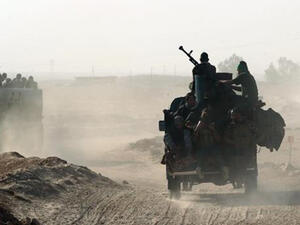 Iraqi Popular Mobilization Forces units deploying around Mosul. (AFP/Ahmad al-Rubaye)