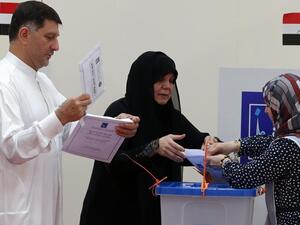 Iraqi nationals residing in the UAE cast their ballots for Iraq’s parliamentary elections at a polling station in Dubai.(Karim Sahib / AFP File Photo)