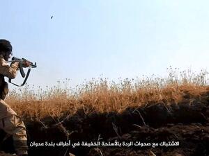 A JKW fighter pictured in the group's propoganda, Twitter
