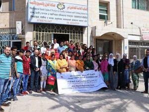 Stakeholders pose for a group photo at the project launch ceremony at the General Trade Union of Workers in Textile, Garment and Clothing Industries. (Jordan Times) 
