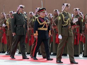 Jordanian King Abdullah II (C) arrives to attend the opening of the Jordanian parliament's new session in the capital Amman on November 7, 2016. (AFP/Stringer)