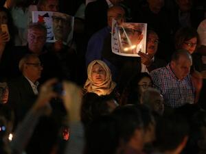 Jordanians gather at the site where prominent Jordanian writer Nahed Hattar was shot dead the previous day outside an Amman court, during a vigil on September 26, 2016. (AFP/Khalil Mazraawi)
