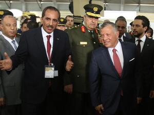 Jordan's King Abdullah II greets the public as he arrives at the opening of the Special Operations Forces Exhibition and Conference (SOFEX) in Amman on May 8, 2018 (KHALIL MAZRAAWI /AFP)